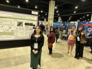 Elizabeth presenting her research poster at the TAGC meeting in March 2024